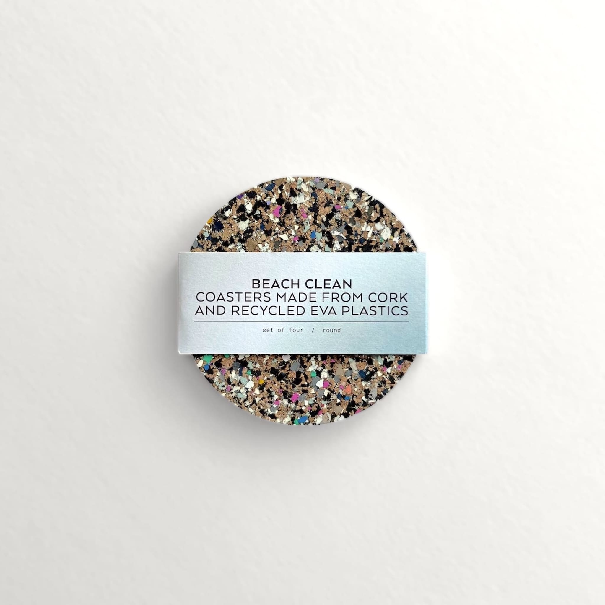 Pack of coasters with a label on a white background