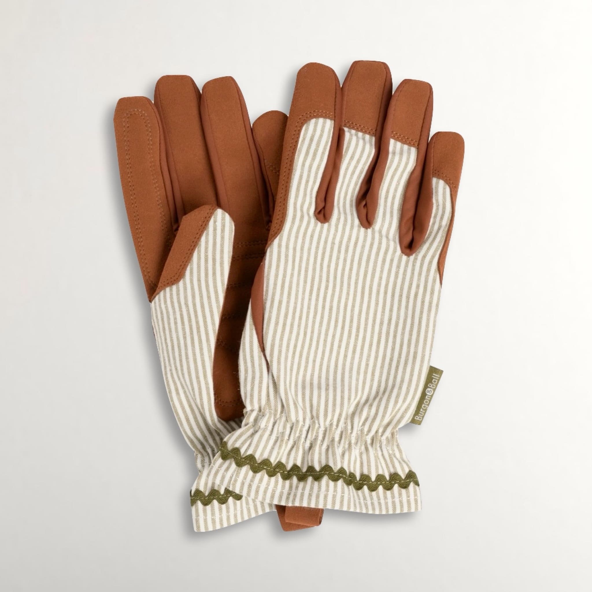 Pair of gardening gloves with faux brown suede palms and green striped cotton backs on a light grey background.