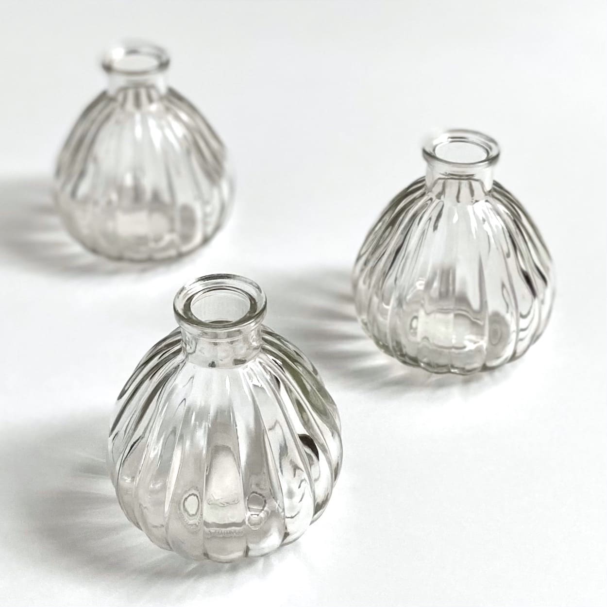 Trio of Small Bulbous Ribbed Vases