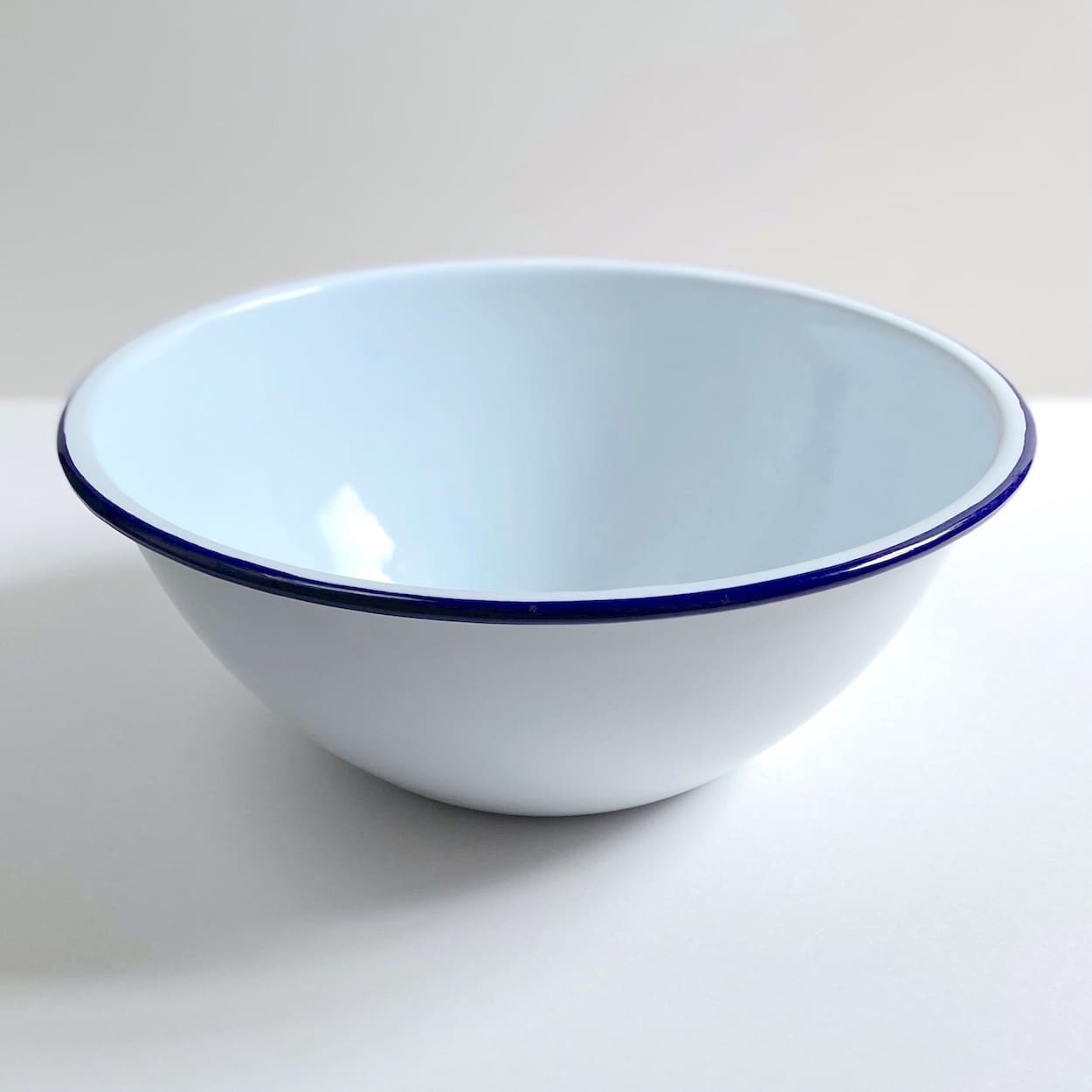 Blue Rimmed White Enamel Mixing Bowl
