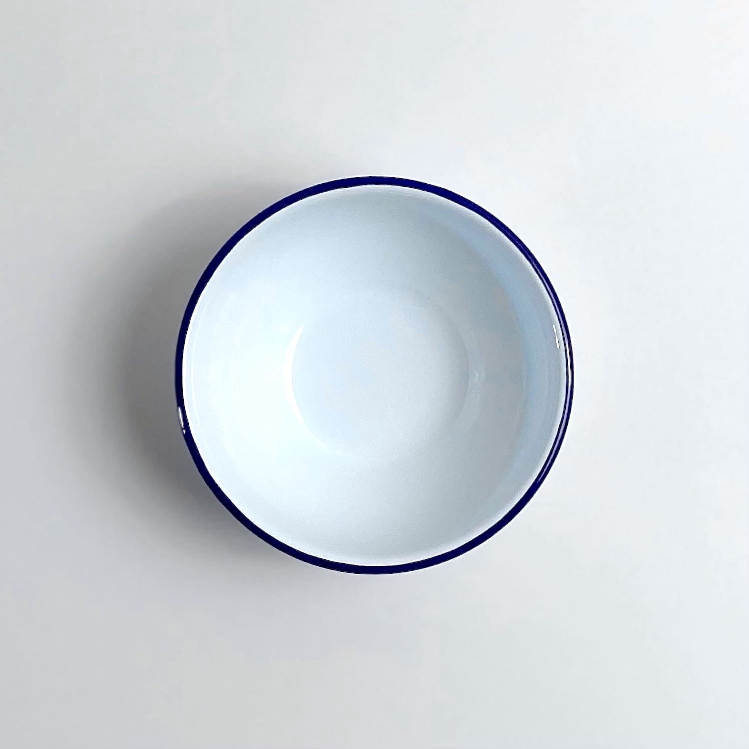 Pair of Blue Rimmed White Enamel Cereal Bowls