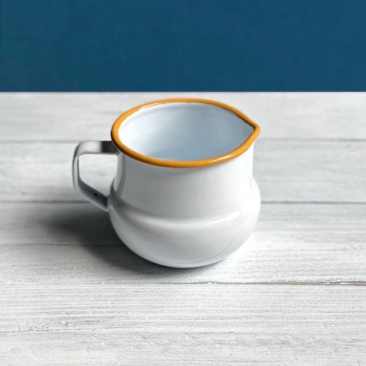 Yellow Rimmed White Enamel Sauce Jug