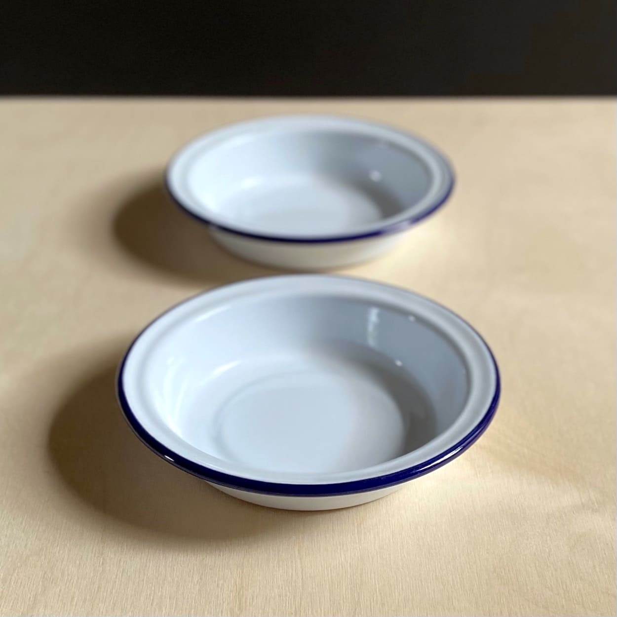 Pair of Blue Rimmed White Enamel Dishes - Small