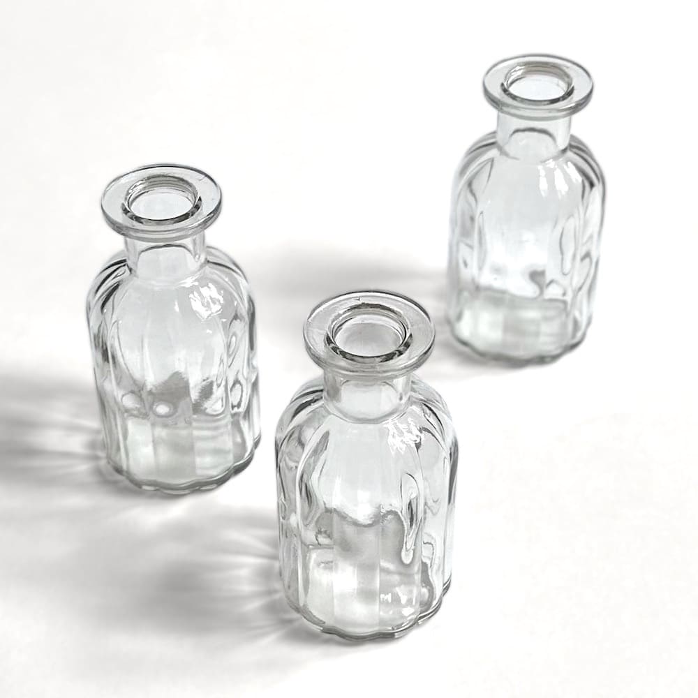 Trio of Small Ribbed Bottle Vases