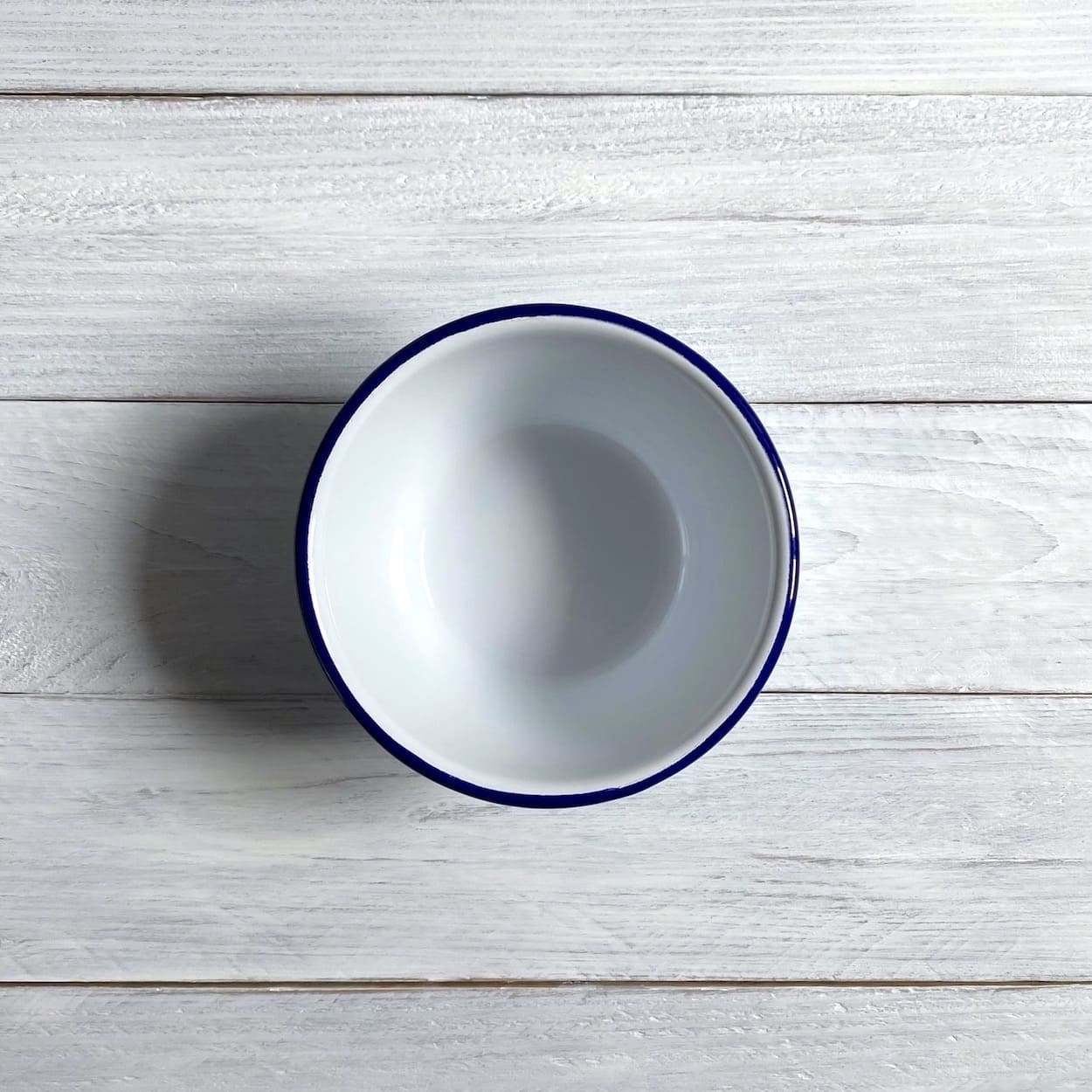 Pair of Blue Rimmed White Enamel Pudding Bowls